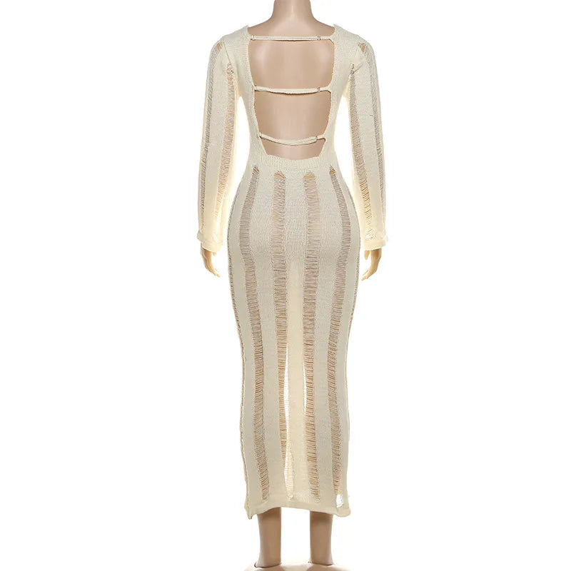 Mannequin wearing a sheer beige dress with long sleeves