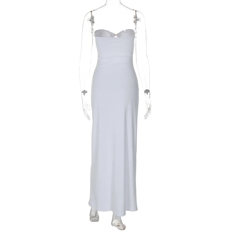 White evening gown on a mannequin against a white background