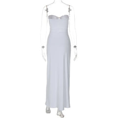 White evening gown on a mannequin against a white background