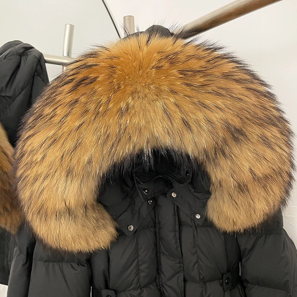 Black puffer jacket with a large brown fur hood