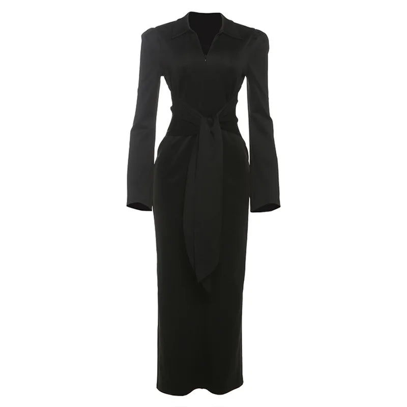 Black dress with long sleeves on a white background