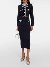 Pearl-trim round-neck long sleeve top with matching high-waist midi skirt