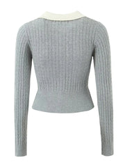 Light gray ribbed sweater with a white collar on a white background