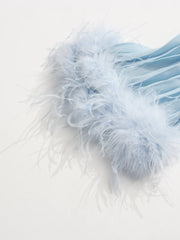 Light blue feathered fabric on a white background