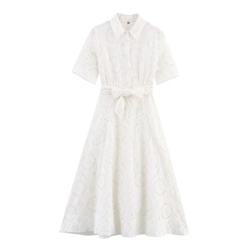 White dress with a subtle pattern on a white background