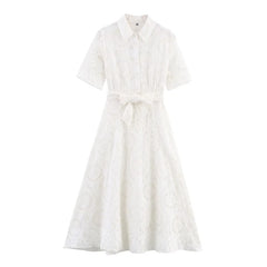 White dress with a subtle pattern on a white background