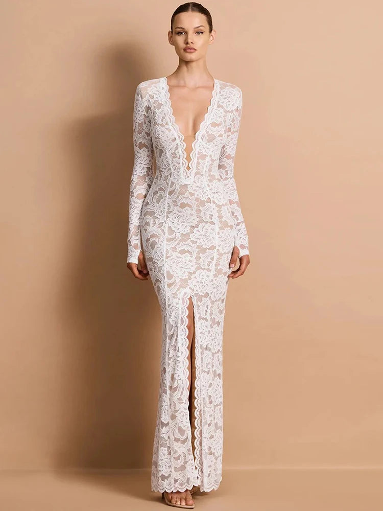 White lace plunge neck maxi dress with long sleeves and thigh slit