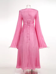 Pink pleated dress on a mannequin against a white background
