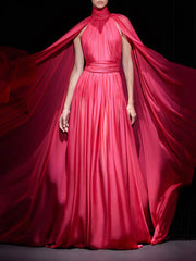 Red evening gown with cape by Modphy on a dark background