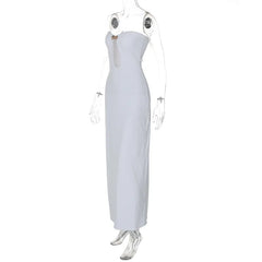 White strapless gown on a mannequin with clear boots against a white background