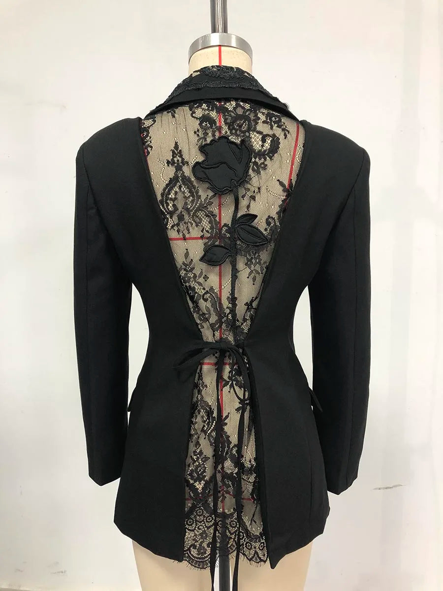 Black blazer with lace detailing on a mannequin against a white background