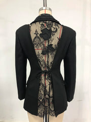 Black blazer with lace detailing on a mannequin against a white background