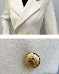 Close-up of a beige coat with a gold button, followed by a close-up of the button on a gray background.