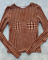 Plaid fitted long sleeve top laid flat
