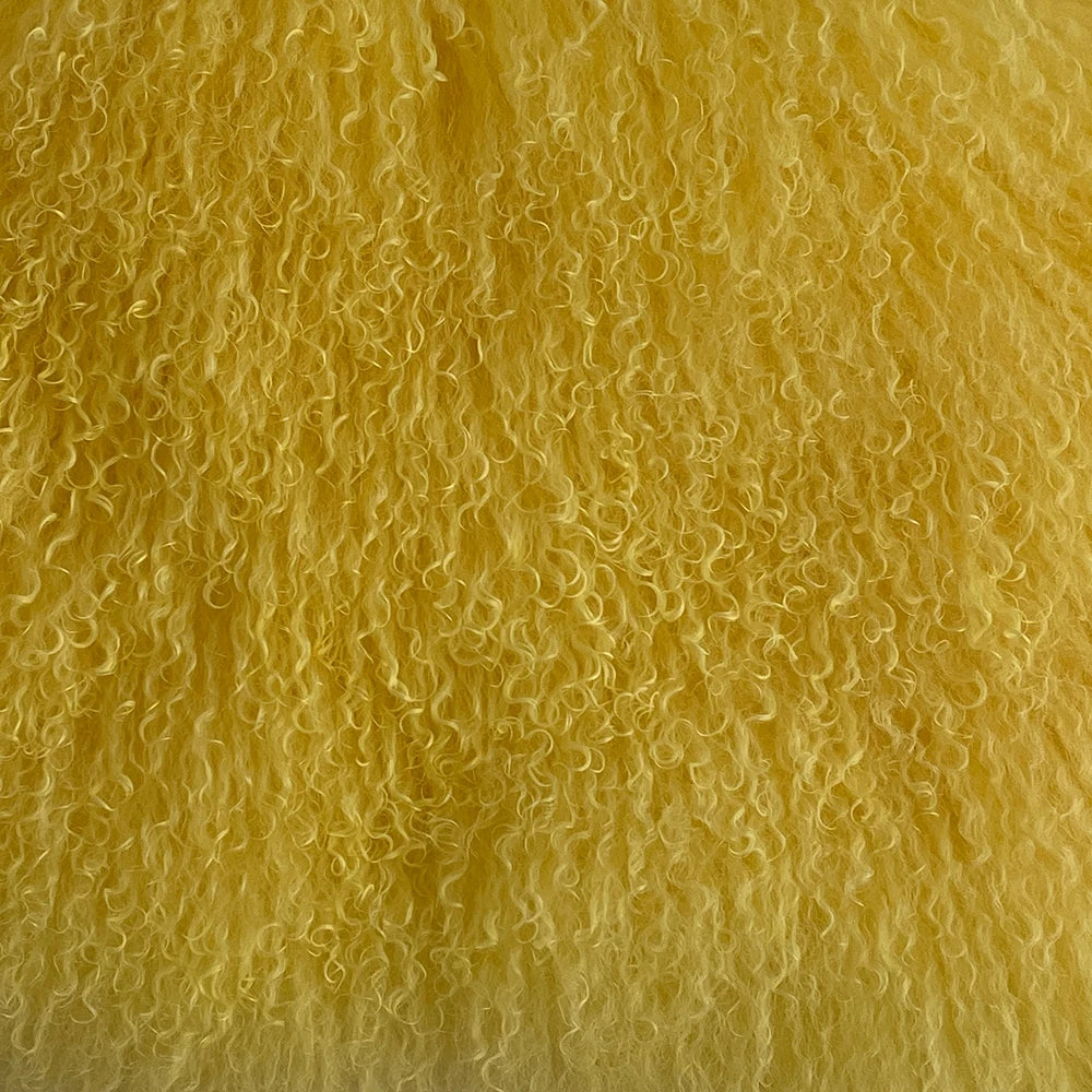 Close-up of yellowish-brown textured fabric