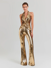 Gold sequin sleeveless V neck wide leg jumpsuit.