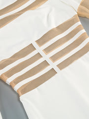 Close-up of a white garment with beige stripes on a gray background