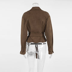 Brown jacket on a mannequin against a white background