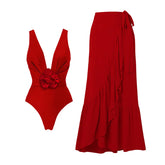 Red one piece swimsuit and wrap skirt