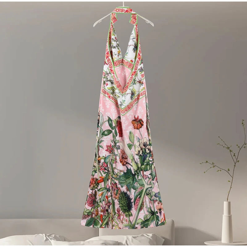 Floral dress hanging on a hanger against a neutral background