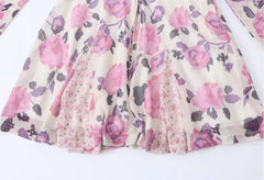 Hem detail of the floral print mesh mini dress