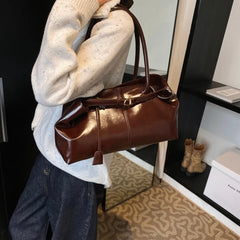 Glossy faux leather top-handle tote bag in dark brown