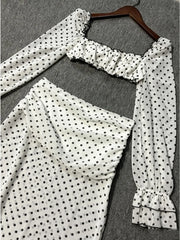 Polka dot two-piece set laid flat