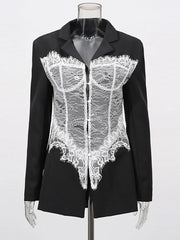 Black blazer with white lace detailing on a mannequin against a white background