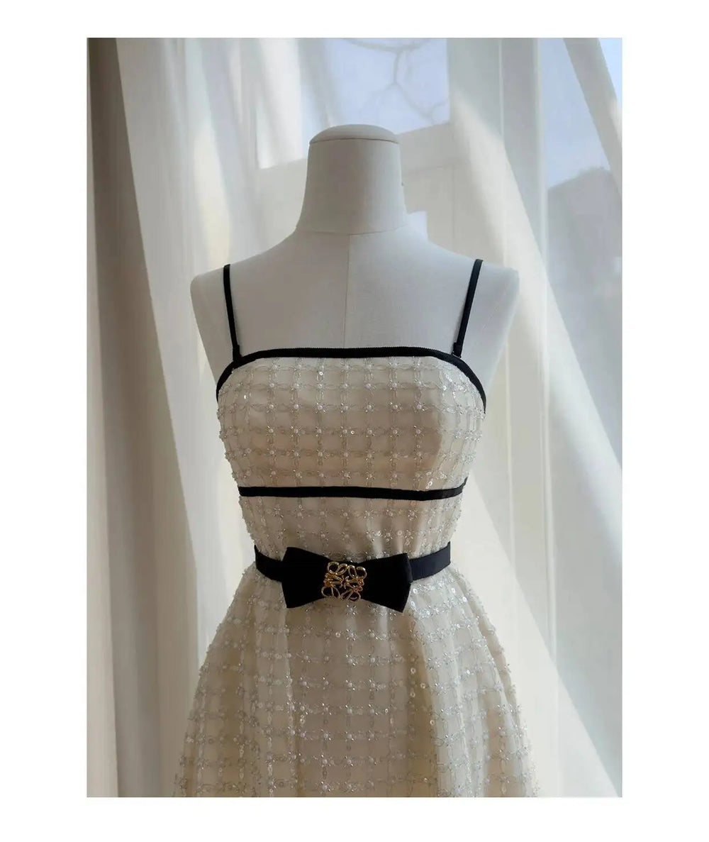 Close-up of the strapless sequin midi dress bodice