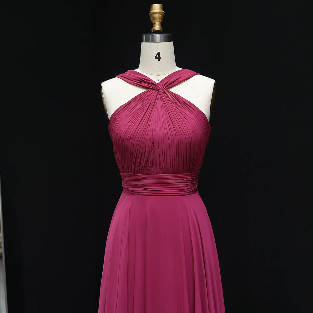 Magenta dress on a mannequin against a black background