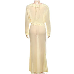 Light yellow dress on a mannequin against a white background