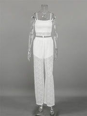 White lace jumpsuit on a mannequin against a gray background