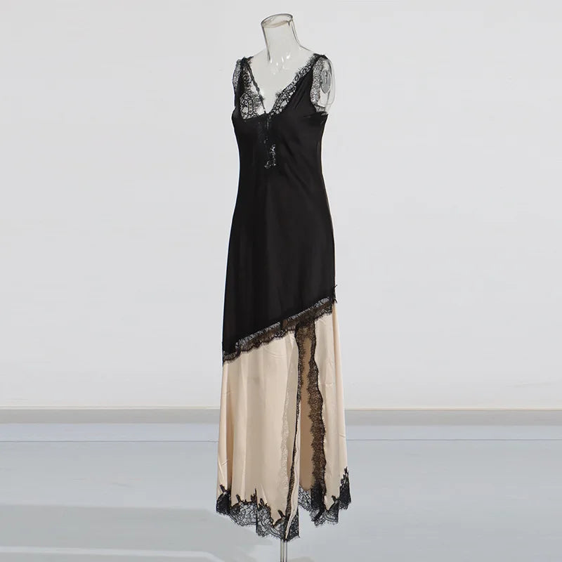 Black and beige dress with lace details on a mannequin