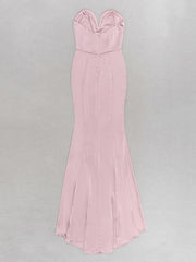 Pink strapless gown on a light gray background