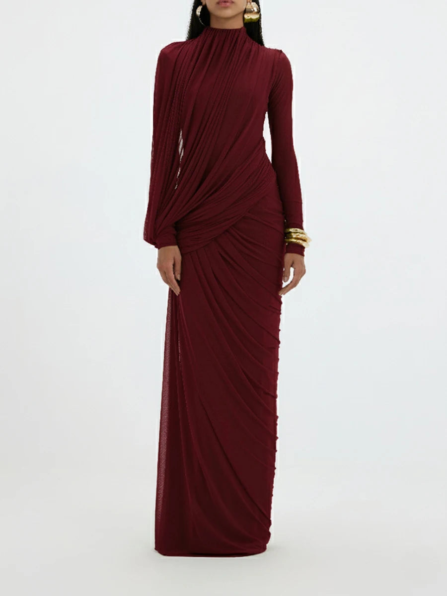 Maroon evening gown with long sleeves on a white background