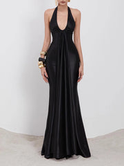 Black halter neck gown on a white background