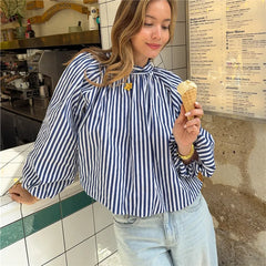 Striped tie back puff sleeve top worn
