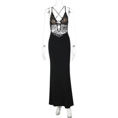 Black slip dress with lace detailing on a mannequin against a white background