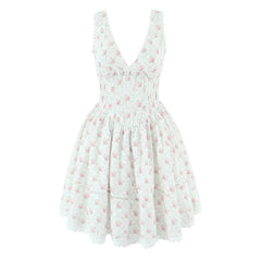 White dress with pink floral pattern on a white background