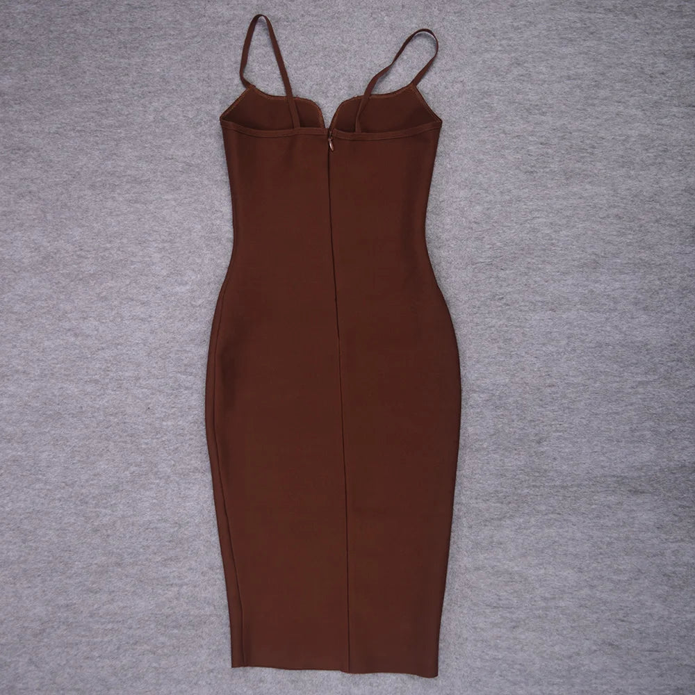 Brown dress with thin straps on a gray background