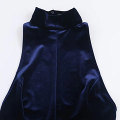 Navy blue velvet garment on a white background