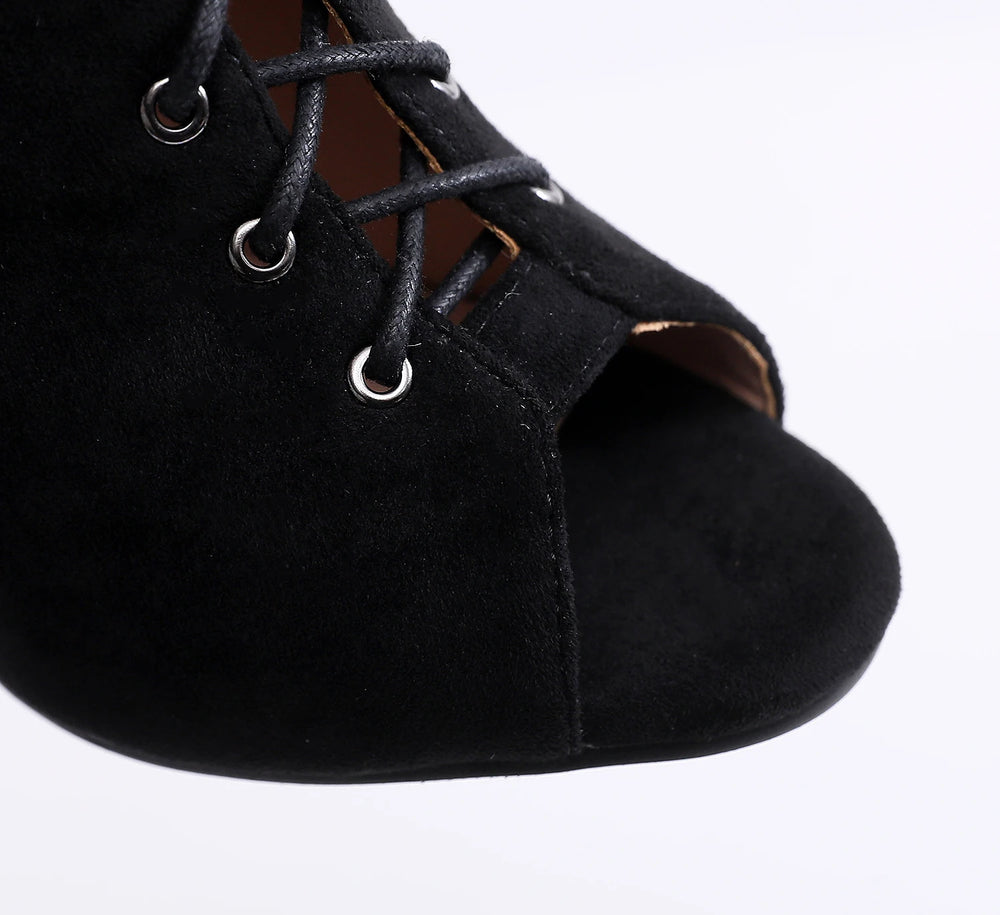 Black suede peep-toe shoe with laces on a white background