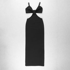 Black dress with bow detail on a white background