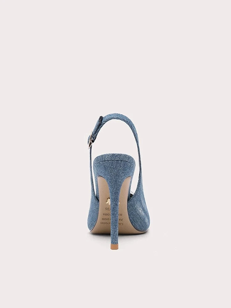 Blue denim high-heeled shoe on a light gray background
