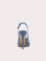 Blue denim high-heeled shoe on a light gray background