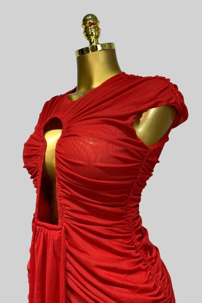 Red dress on a mannequin against a gray background