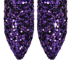 Close-up of the sequined toe caps on matching boots