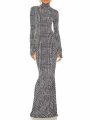 Long sleeve plaid sheath dress styled for refined dressing