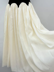 White chiffon skirt on a plain background