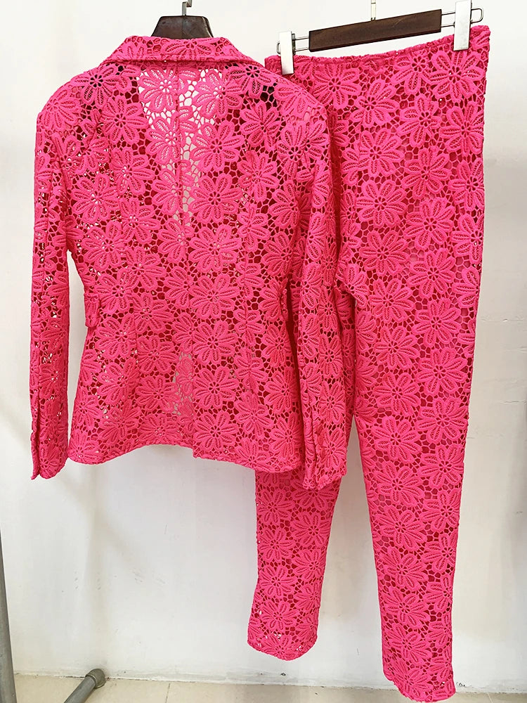 Back view of a rose pink Guipure lace blazer and pencil pants suit on hangers